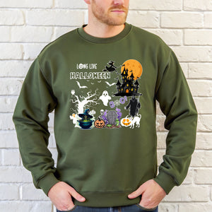 A man wearing a green sweatshirt with a Halloween-themed graphic design on it.