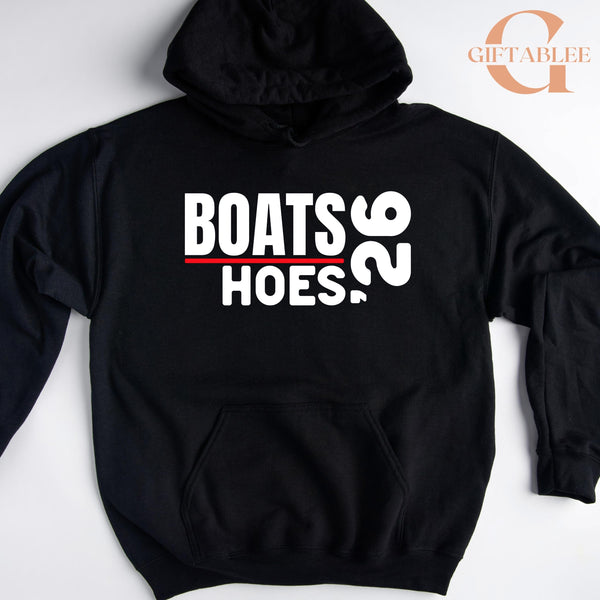 A black hoodie with white text printed on it.