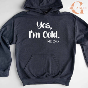 A gray hoodie with white text and a graphic design.