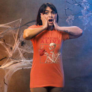Staying Alive (Barely) – Skeleton Drinking Coffee Shirt for Caffeine Addicts