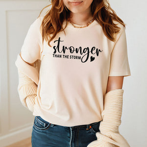 Stronger Than The Storm – Resilience Tee for Fighters & Survivors