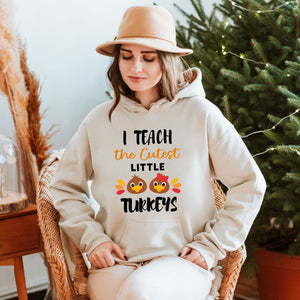 Chaos, But Make It Cozy – I Teach The Cutest Little Turkeys Hoodie for Teachers