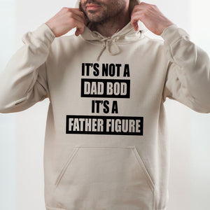 A man wearing a white hoodie with the text "IT'S NOT A DAD BOD IT'S A FATHER FICK" printed on it.