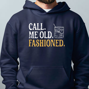 A navy blue hoodie with a graphic design that says "CALL. ME OLD. FASHIONED."