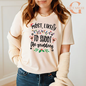 A woman wearing a white t-shirt with a humorous text printed on it.
