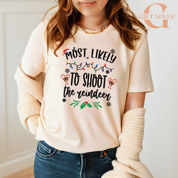 A woman wearing a white t-shirt with a humorous text printed on it.
