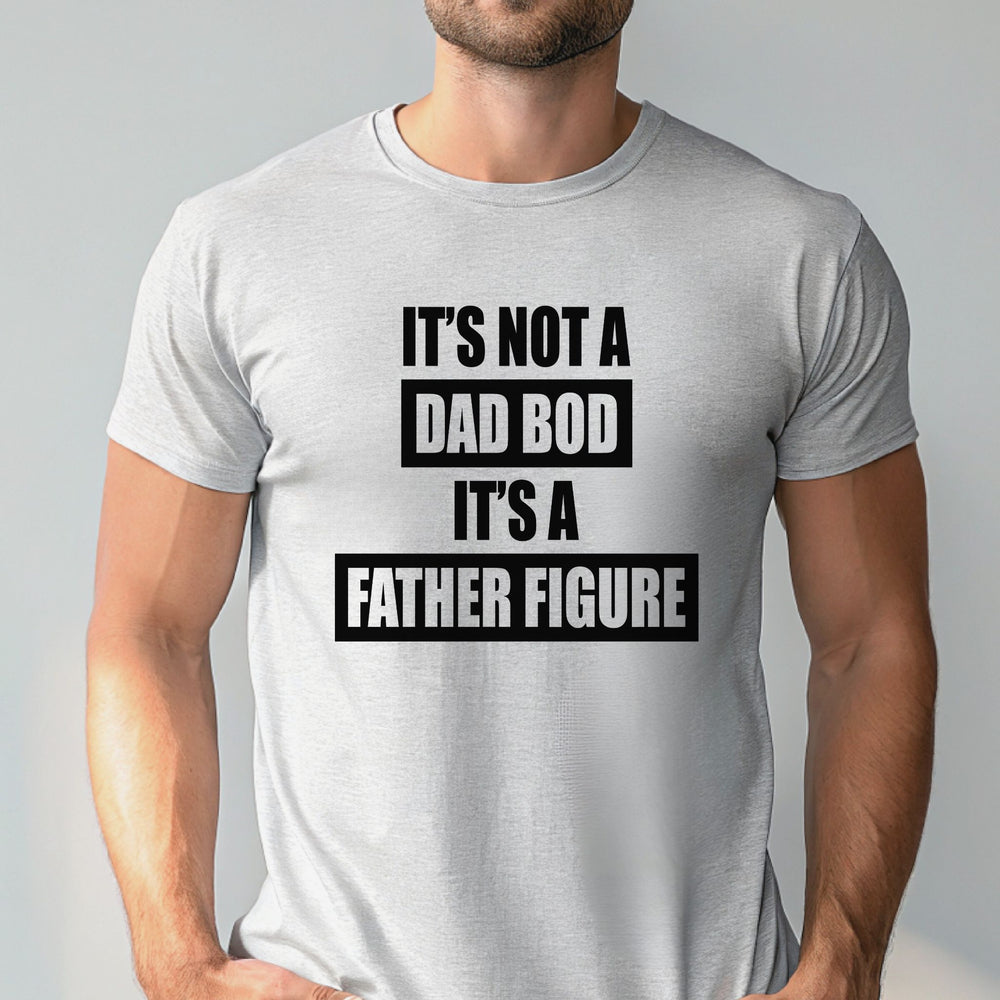 A man wearing a gray t-shirt with the text "IT'S NOT A DAD BOD IT'S A FATHER FIGURE" printed on it.