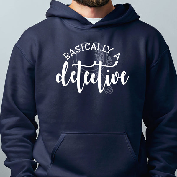 A navy blue hoodie with the text "BASICALLY A DETECTIVE" printed on it.