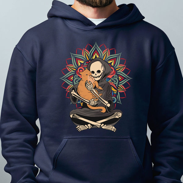 A person wearing a navy blue hoodie with a graphic design depicting a skeleton holding a cat.