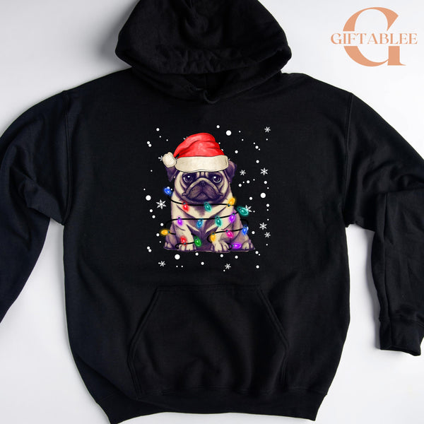 A black hoodie with a graphic of a pug wearing a Santa hat and surrounded by Christmas lights.