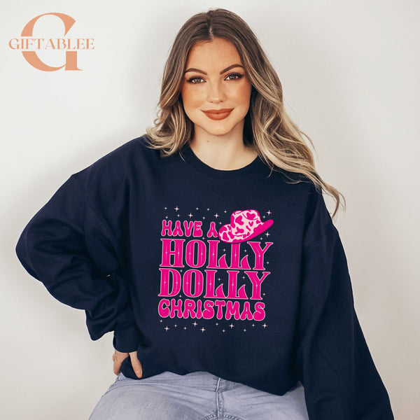 A woman wearing a black sweatshirt with a pink and white design and text on it.