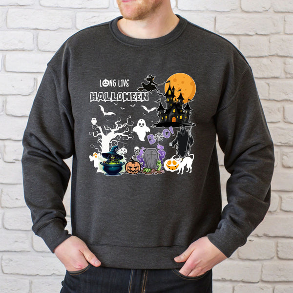 A man wearing a grey sweatshirt with a Halloween-themed graphic design featuring a castle, ghost, pumpkin, and other spooky and festive elements.