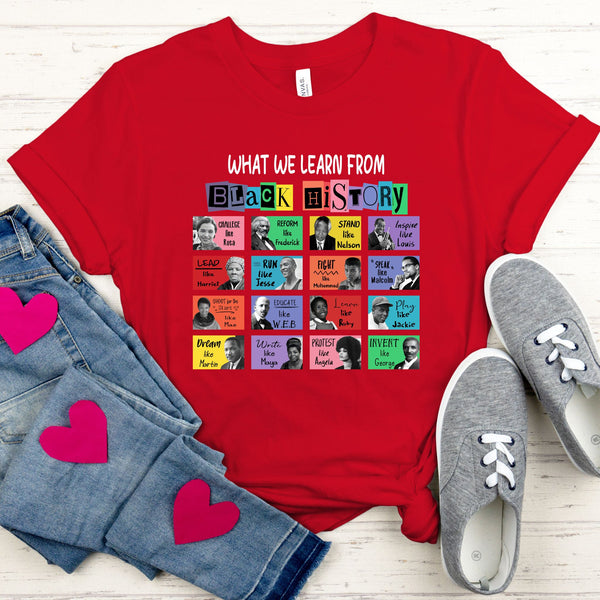 A red t-shirt with a collage of black-and-white portraits of various historical figures, along with the text "WHAT WE LEARN FROM BLACK HISTORY" and a list of quotes attributed to these individuals. The t-shirt is displayed on a white background, with a pair of jeans and gray sneakers visible in the foreground.