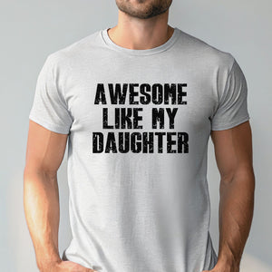 A man wearing a gray t-shirt with the text "AWESOME LIKE MY DAUGHTER" printed on it.