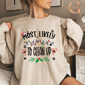 A woman wearing a beige sweater with a humorous text printed on it.
