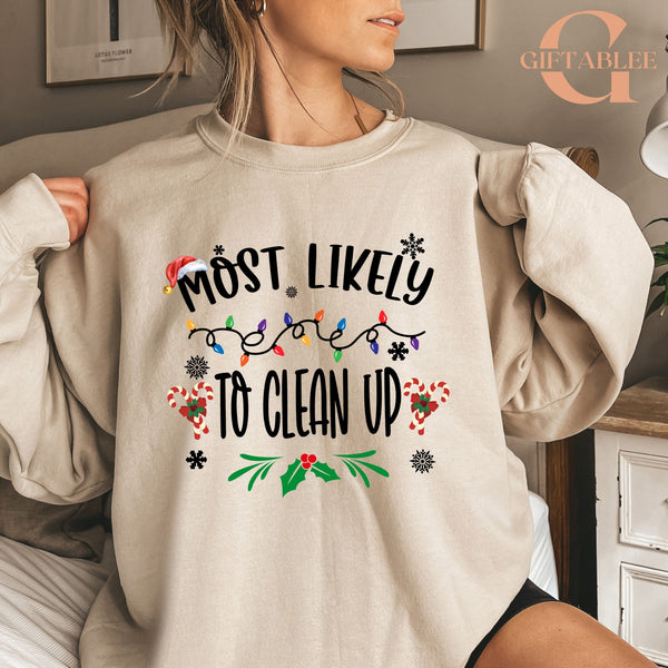 A woman wearing a beige sweater with a humorous text printed on it.