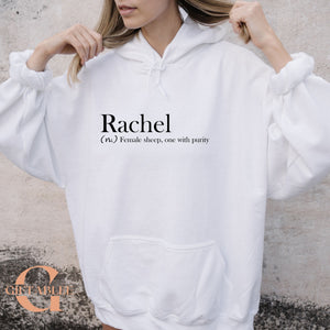 A person wearing a white hoodie with the word "Rachel" printed on it.